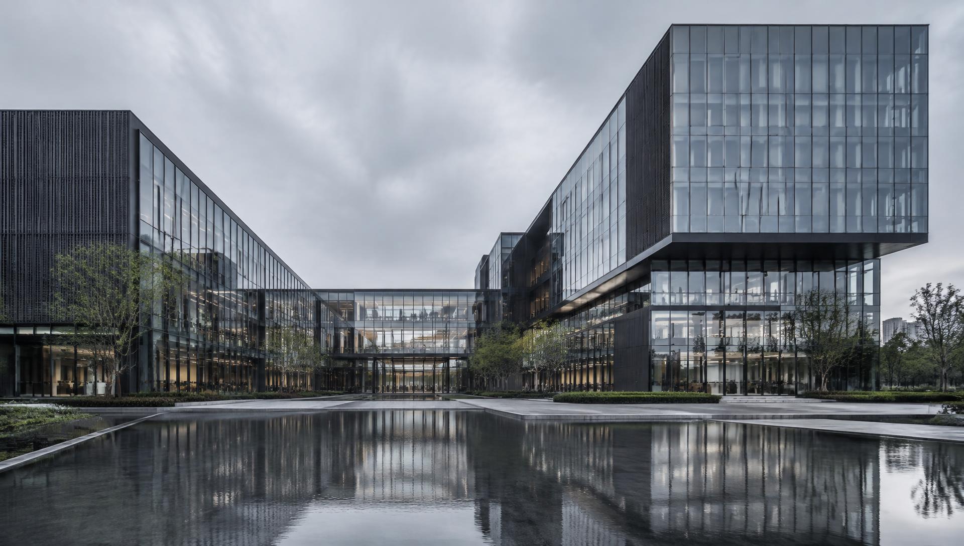 Panoramic view of a modern commercial glass building complex